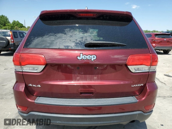 2016 Jeep Grand Cherokee Laredo with VIN 1C4RJFAG8GC413490, listed as a Copart auction lot 62347445 with 104,056 mi miles and Salvage title. Bid and sale history available at DreamBid. Image 6.