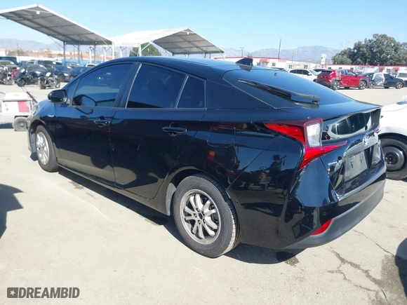 2021 Toyota Prius L Eco with VIN JTDKAMFU3M3148574, listed as a IAAI auction lot 41624303 with 89,747 mi miles. Bid and sale history available at carsss.com. Image 3.