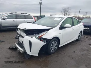 2022 Toyota Prius L Eco with VIN JTDKAMFU3N3188445, listed as a IAAI auction lot 41138076 with 25,225 mi miles and . Bid and sale history available at DreamBid. Image 18.