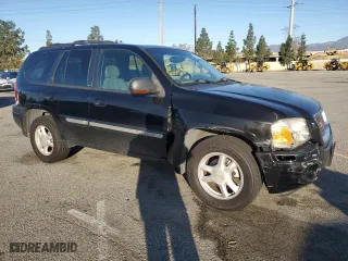 2002 GMC Envoy SLT with VIN 1GKDS13S522485892, listed as a Copart auction lot 49248615 with 152,326 mi miles and Salvage Title. Bid and sale history available at carsss.com. Image 4.