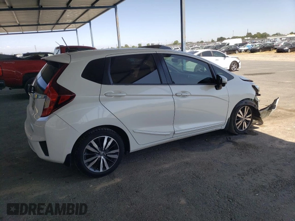 2015 Honda Fit EX-L с VIN 3HGGK5H86FM768802, выставлен на аукционе Copart как лот 58940725 с пробегом Не указан миль и Списание • Salvage title. История ставок и продаж доступна на DreamBid. Изображение 3.