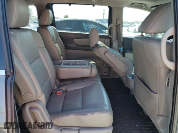 2011 Honda Odyssey Touring with VIN 5FNRL5H97BB501213, listed as a Copart auction lot 57314115 with 283,538 mi miles and Salvage title. Bid and sale history available at DreamBid. Image 10.