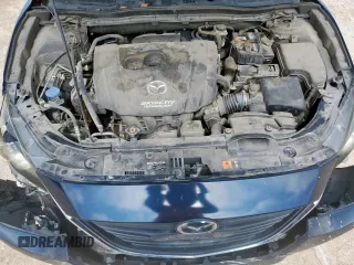 2015 Mazda 3 i Grand Touring with VIN 3MZBM1W77FM219595, listed as a Copart auction lot 61041105 with 140,846 mi miles and Salvage title. Bid and sale history available at DreamBid. Image 11.