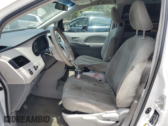 2014 Toyota Sienna L with VIN 5TDZK3DC3ES430634, listed as a Copart auction lot 60715375 with 122,621 mi miles and Salvage title. Bid and sale history available at DreamBid. Image 7.