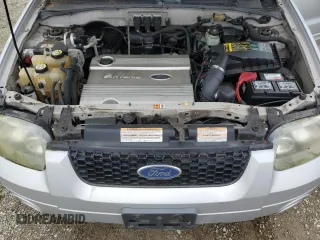 2005 Ford Escape Hybrid with VIN 1FMCU95HX5KC07541, listed as a Copart auction lot 84209534 with 187,074 mi miles and Clean title. Bid and sale history available at DreamBid. Image 11.