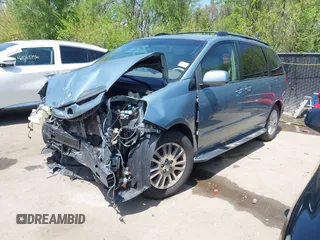 2009 Toyota Sienna XLE with VIN 5TDZK22C99S239755, listed as a IAAI auction lot 42096411 with 214,983 mi miles. Bid and sale history available at carsss.com. Image 18.