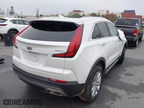 2022 Cadillac XT4 FWD Premium Luxury with VIN 1GYFZCR49NF100393, listed as a IAAI auction lot 42497187 with 23,672 mi miles and . Bid and sale history available at DreamBid. Image 4.