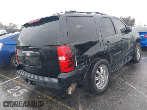 2008 Chevrolet Tahoe LTZ with VIN 1GNFC13J48R160246, listed as a IAAI auction lot 41808982 with 166,516 mi miles and . Bid and sale history available at DreamBid. Image 4.