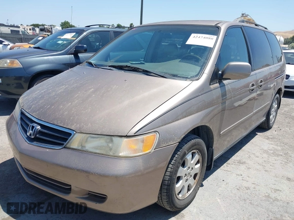 2003 Honda Odyssey EX-L with VIN 5FNRL18993B127164, listed as a IAAI auction lot 42474080 with 152,838 mi miles and . Bid and sale history available at DreamBid. Image 2.