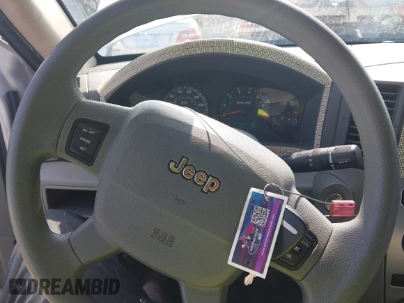 2006 Jeep Grand Cherokee Laredo with VIN 1J4GS48K56C260532, listed as a IAAI auction lot 42607110 with 153,110 mi miles and . Bid and sale history available at DreamBid. Image 11.