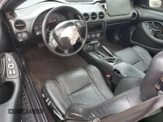 2002 Pontiac Firebird Formula z VIN 2G2FV22G822114416, wystawiony jako Copart lot #80131354 z przebiegiem 130 097 mil mil oraz Szkoda całkowita • Salvage title. Historia ofert i sprzedaży dostępna na DreamBid. Obrazek 8.