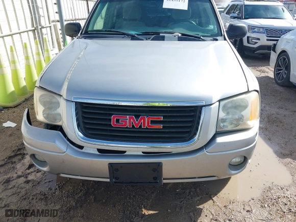 2005 GMC Envoy SLE with VIN 1GKDS13S252284455, listed as a IAAI auction lot 41455172 with 171,559 mi miles. Bid and sale history available at carsss.com. Image 12.