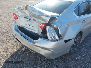 2016 Nissan Altima S with VIN 1N4AL3APXGC288696, listed as a IAAI auction lot 41209580 with 131,709 mi miles and . Bid and sale history available at carsss.com. Image 14.