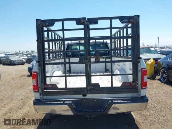 2018 Ford F-150 XL with VIN 1FTNF1CG9JKC41855, listed as a IAAI auction lot 41974456 with 330,339 mi miles and . Bid and sale history available at DreamBid. Image 16.
