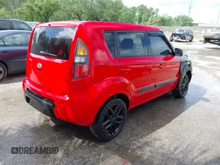 2011 Kia Soul + with VIN KNDJT2A21B7230986, listed as a IAAI auction lot 41683588 with 175,790 mi miles. Bid and sale history available at carsss.com. Image 4.