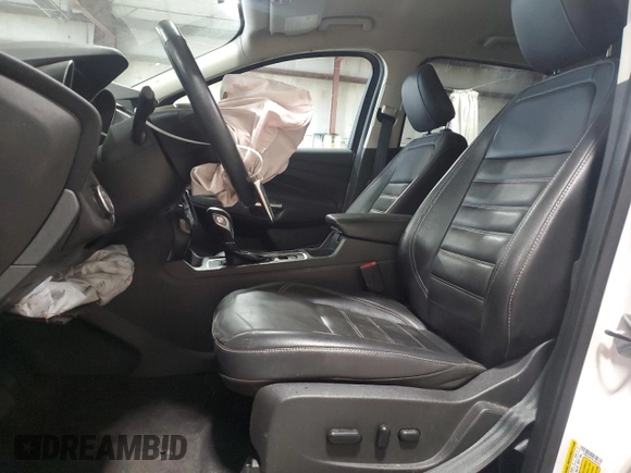2019 Ford Escape Titanium z VIN 1FMCU9J97KUA85865, wystawiony jako Copart lot #56643135 z przebiegiem Nie podano mil oraz Szkoda całkowita • Salvage title. Historia ofert i sprzedaży dostępna na DreamBid. Obrazek 7.