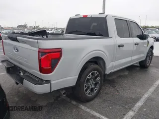 2024 Ford F-150 STX with VIN 1FTEW2KP7RFA29709, listed as a IAAI auction lot 41915128 with 5,883 mi miles and . Bid and sale history available at carsss.com. Image 4.