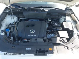 2018 Mazda CX-5 Grand Touring with VIN JM3KFADM2J1422512, listed as a IAAI auction lot 42010801 with 48,567 mi miles and . Bid and sale history available at DreamBid. Image 10.