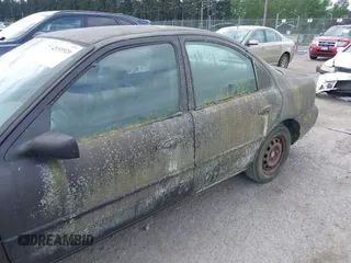 1995 Ford Contour z VIN 3FALP6633SM116313, wystawiony jako IAAI lot #42058920 z przebiegiem 192 905 mil mil oraz . Historia ofert i sprzedaży dostępna na DreamBid. Obrazek 15.