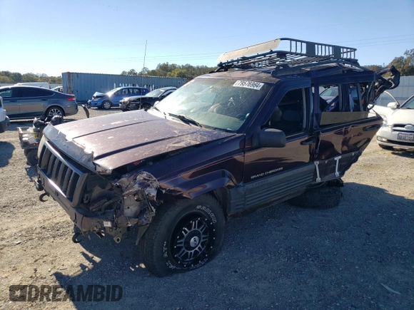 1997 Jeep Grand Cherokee Laredo with VIN 1J4GZ58Y3VC653093, listed as a Copart auction lot 79576964 with 0 mi miles and Salvage Title. Bid and sale history available at carsss.com. Image 1.