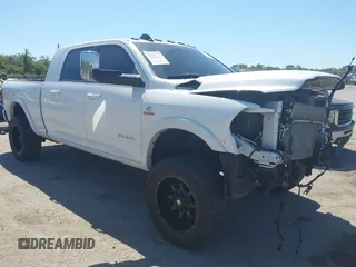 2019 Ram 2500 Laramie z VIN 3C6UR5NL2KG718789, wystawiony jako IAAI lot #42046325 z przebiegiem 54 965 mil mil oraz . Historia ofert i sprzedaży dostępna na DreamBid. Obrazek 1.