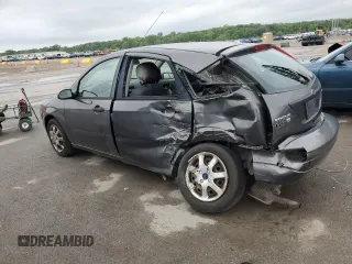 2005 Ford Focus S with VIN 3FAFP37N75R120187, listed as a Copart auction lot 57390605 with 163,547 mi miles and Salvage title. Bid and sale history available at DreamBid. Image 2.