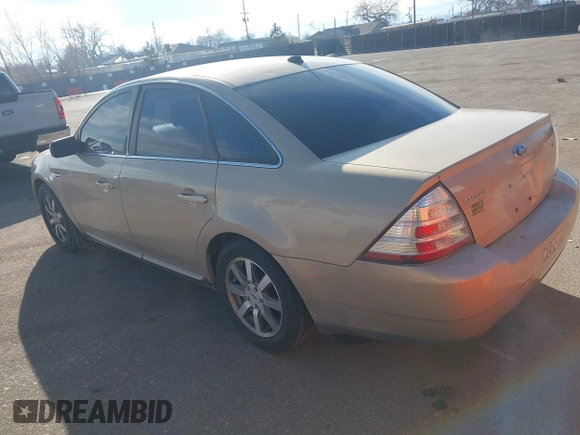 2008 Ford Taurus SEL with VIN 1FAHP24W38G111319, listed as a IAAI auction lot 41585092 with 216,419 mi miles. Bid and sale history available at carsss.com. Image 3.