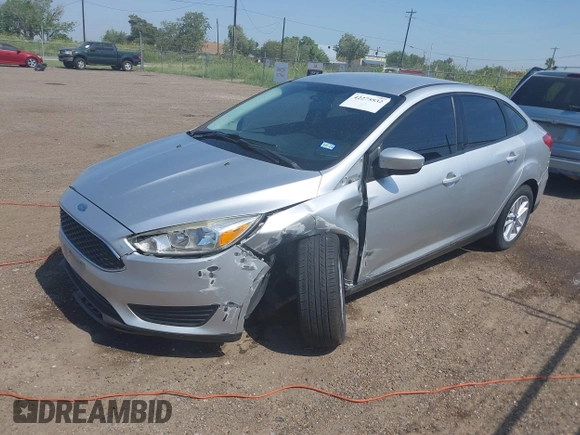 2018 Ford Focus SE z VIN 1FADP3FE0JL321530, wystawiony jako IAAI lot #42275532 z przebiegiem 65 412 mil mil oraz . Historia ofert i sprzedaży dostępna na DreamBid. Obrazek 17.