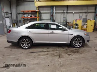 2013 Ford Taurus Limited with VIN 1FAHP2F83DG116657, listed as a IAAI auction lot 41533075 with 124,649 mi miles. Bid and sale history available at carsss.com. Image 13.