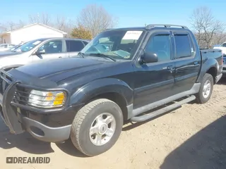 2004 Ford Explorer Sport Trac XLS with VIN 1FMZU67K64UC40055, listed as a IAAI auction lot 41653024 with 197,217 mi miles. Bid and sale history available at carsss.com. Image 17.