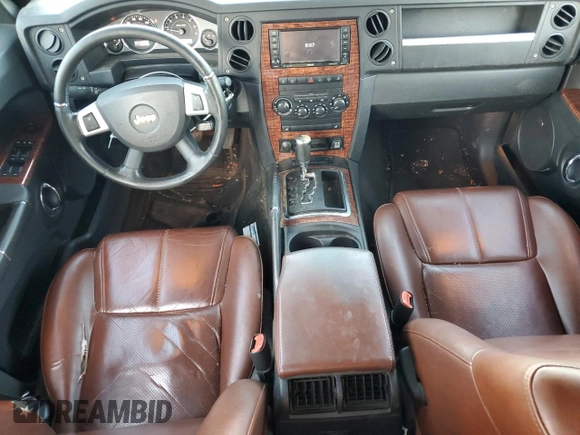 2008 Jeep Commander Limited with VIN 1J8HH58N98C236772, listed as a Copart auction lot 71042404 with 217,780 mi miles and Salvage title. Bid and sale history available at DreamBid. Image 8.