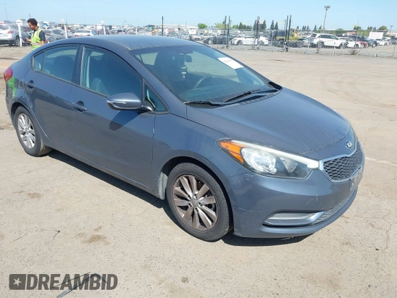 2015 Kia Forte LX with VIN KNAFX4A61F5354649, listed as a IAAI auction lot 42040586 with 113,436 mi miles. Bid and sale history available at carsss.com. Image 1.
