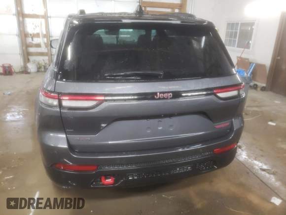 2022 Jeep Grand Cherokee Trailhawk with VIN 1C4RJHCG8N8572275, listed as a Copart auction lot 85665194 with 15,692 mi miles and Salvage title. Bid and sale history available at DreamBid. Image 6.