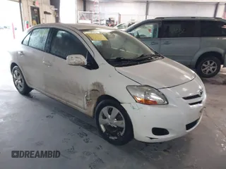 2008 Toyota Yaris with VIN JTDBT923181247058, listed as a IAAI auction lot 41749987 with 115,877 mi miles. Bid and sale history available at carsss.com. Image 1.