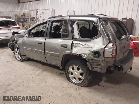2005 GMC Envoy SLT with VIN 1GKDT13S352257892, listed as a IAAI auction lot 41690880 with 134,216 mi miles. Bid and sale history available at carsss.com. Image 3.