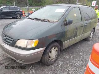 2001 Toyota Sienna LE with VIN 4T3ZF13C71U351289, listed as a IAAI auction lot 41966579 with 254,740 mi miles. Bid and sale history available at carsss.com. Image 2.