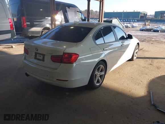 2013 BMW 3 Series 328i xDrive with VIN WBA3B5C56DF596114, listed as a IAAI auction lot 41313136 with 98,847 mi miles. Bid and sale history available at carsss.com. Image 4.