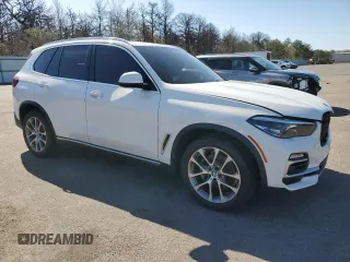 2020 BMW X5 xDrive40i with VIN 5UXCR6C09L9C13127, listed as a Copart auction lot 53941035 with 76,685 mi miles and Salvage title. Bid and sale history available at DreamBid. Image 4.