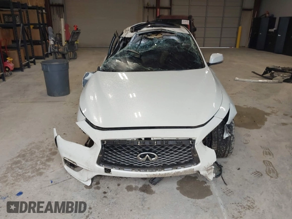 2018 Infiniti Q50 Sport z VIN JN1EV7AP5JM352872, wystawiony jako IAAI lot #42107252 z przebiegiem 81 889 mil mil oraz . Historia ofert i sprzedaży dostępna na DreamBid. Obrazek 13.