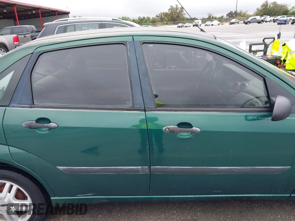 2000 Ford Focus LX with VIN 1FAFP33P8YW336316, listed as a IAAI auction lot 41904496 with 215,100 mi miles and . Bid and sale history available at carsss.com. Image 14.