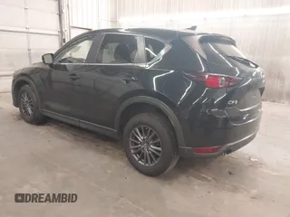 2020 Mazda CX-5 Touring with VIN JM3KFBCM9L1785125, listed as a IAAI auction lot 41983561 with 101,062 mi miles and . Bid and sale history available at carsss.com. Image 3.