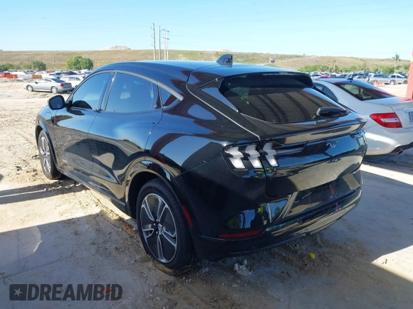 2023 Ford Mustang Mach-E Premium z VIN 3FMTK3R49PMA72364, wystawiony jako IAAI lot #41999783 z przebiegiem 15 023 mil mil oraz . Historia ofert i sprzedaży dostępna na DreamBid. Obrazek 3.