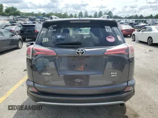 2016 Toyota RAV4 XLE with VIN JTMRFREV6GJ099720, listed as a Copart auction lot 60200585 with 148,801 mi miles and Salvage title. Bid and sale history available at DreamBid. Image 6.