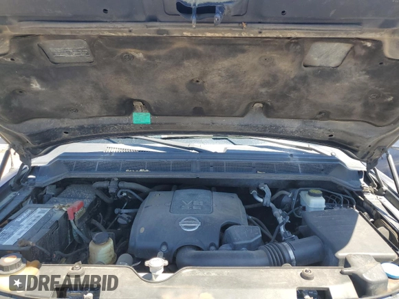 2011 Nissan Titan SL с VIN 1N6AA0EC0BN305280, выставлен на аукционе Copart как лот 54506785 с пробегом 284 074 миль миль и Списание • Salvage title. История ставок и продаж доступна на DreamBid. Изображение 11.