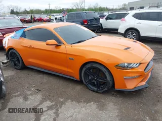 2021 Ford Mustang EcoBoost with VIN 1FA6P8TD5M5151336, listed as a IAAI auction lot 41916198 with 58,990 mi miles and . Bid and sale history available at DreamBid. Image 1.