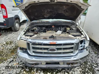 2001 Ford F-350 XL with VIN 1FTWW32F11EB16761, listed as a Copart auction lot 62511635 with 257,065 mi miles and Salvage title. Bid and sale history available at DreamBid. Image 11.