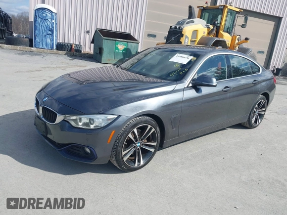 2016 BMW 4 Series 428i xDrive with VIN WBA4C9C56GG140427, listed as a IAAI auction lot 41886670 with 94,426 mi miles and . Bid and sale history available at carsss.com. Image 2.