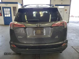 2018 Toyota RAV4 LE with VIN JTMBFREV9JJ743672, listed as a Copart auction lot 62510955 with 141,971 mi miles and Salvage title. Bid and sale history available at DreamBid. Image 6.