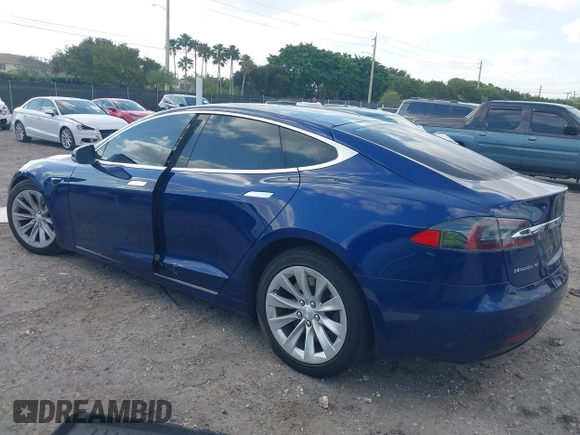 2017 Tesla Model S 100D with VIN 5YJSA1E28HF217489, listed as a IAAI auction lot 42128388 with Not provided miles and . Bid and sale history available at DreamBid. Image 3.