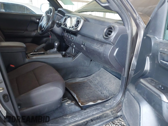 2017 Toyota Tacoma SR5 with VIN 3TMCZ5AN6HM045057, listed as a IAAI auction lot 41883533 with 213,760 mi miles and . Bid and sale history available at carsss.com. Image 5.